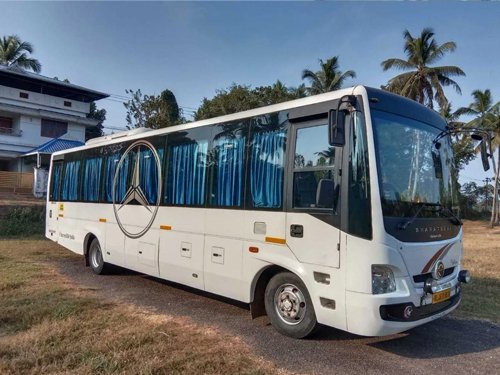 Executive Mini Coach AC bus rental service in kochi
